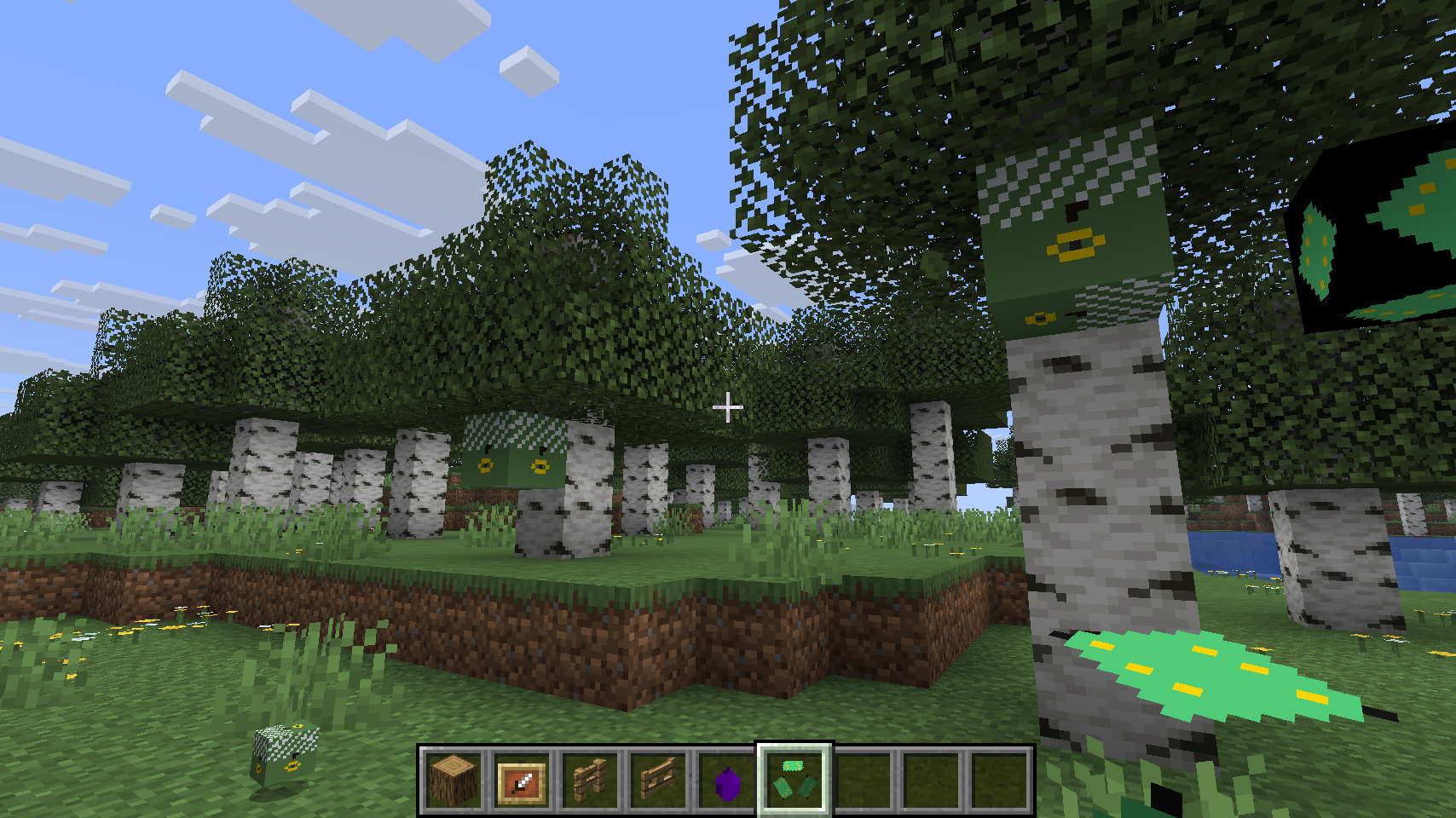 Landscape showing custom trees alongside vanilla Minecraft biomes
